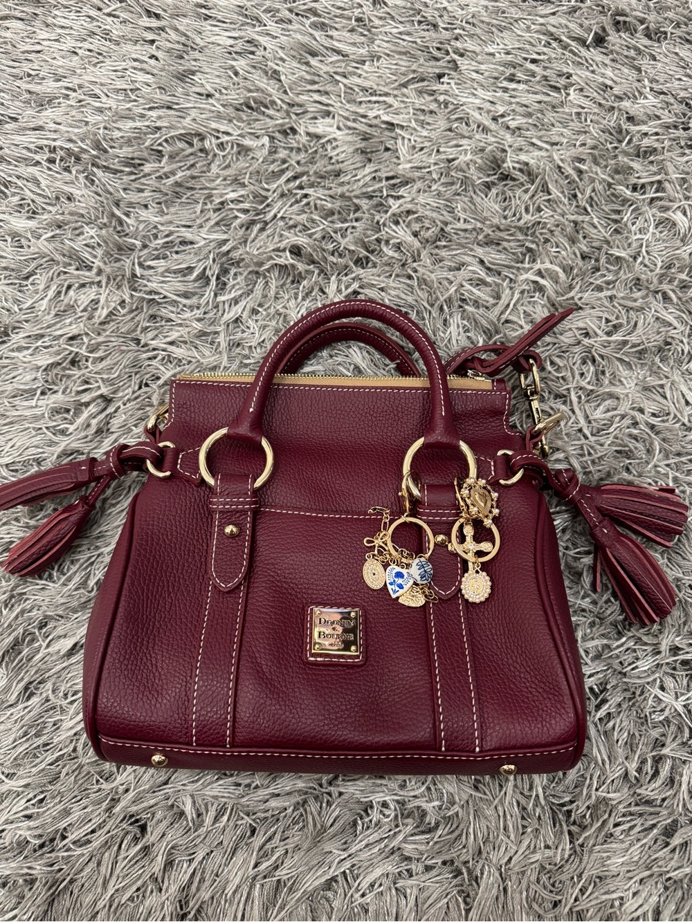 Dooney & Bourke Lucca Wine Red Pebble Leather Satchel with Gold Accents, charms